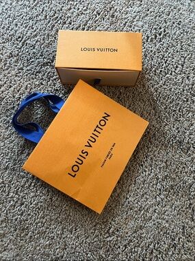 Authentic Louis Vuitton Orange Paper Shopping Bag with Blue Handles and Matching